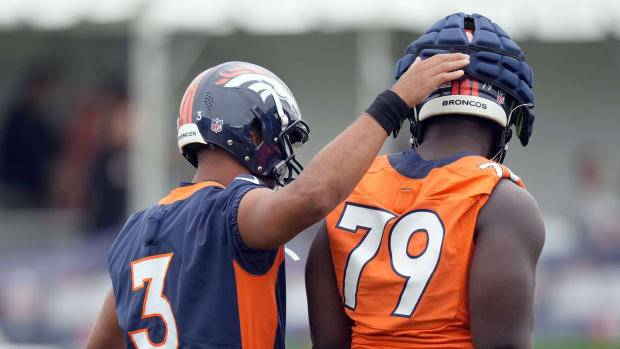 Lloyd Cushenberry and Russell Wilson Ron Chenoy-USA TODAY Sports